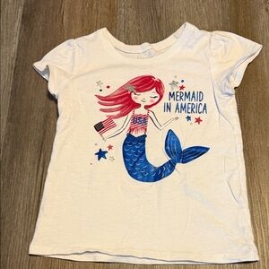 Place White Tee with Red-Haired Mermaid and Blue Tail